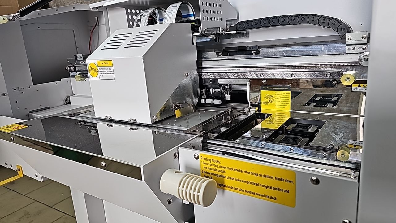 UV printer carriage and flatbed system